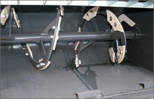 Coclea con raschiatori regolabili.